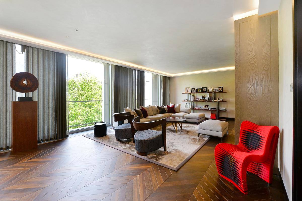 2-21-Chesham-Place (14).jpg Architectural Homes Chesham Place red sofa